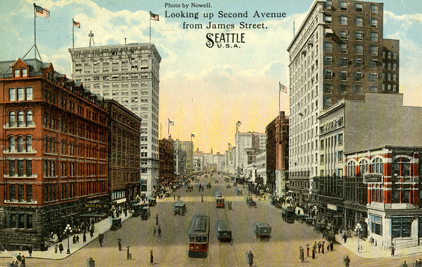 Busy 2nd Avenue in downtown Seattle, looking northwest from James Street. Many of these buildings are still standing today.