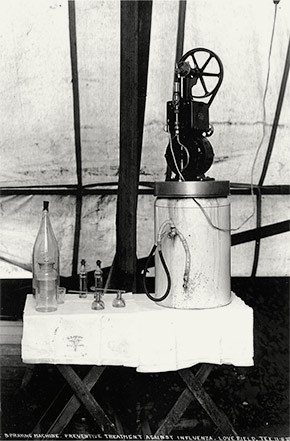 A spraying machine used to disinfect the throats and nasal passages of soldiers at Love Field.  Devices such as this were used in many military camps during the epidemic as a preventive measure.