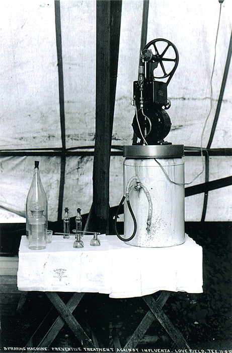A spraying machine used to disinfect the throats and nasal passages of soldiers at Love Field.  Devices such as this were used in many military camps during the epidemic as a preventive measure.