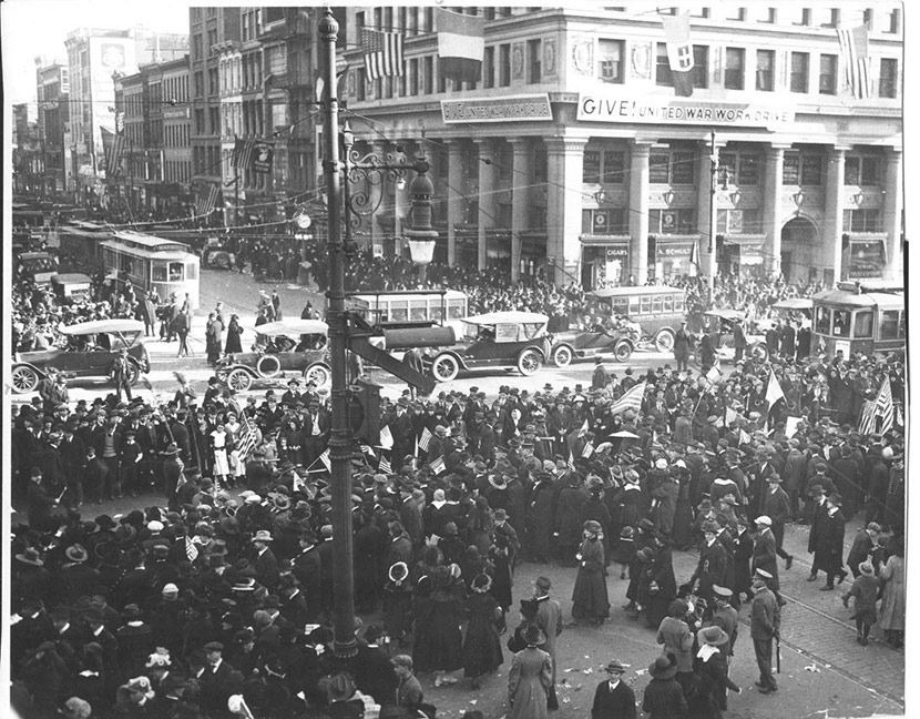 The crowded Armistice Day celebration in the busy Four Corners section of Newark, November 11, 1918.