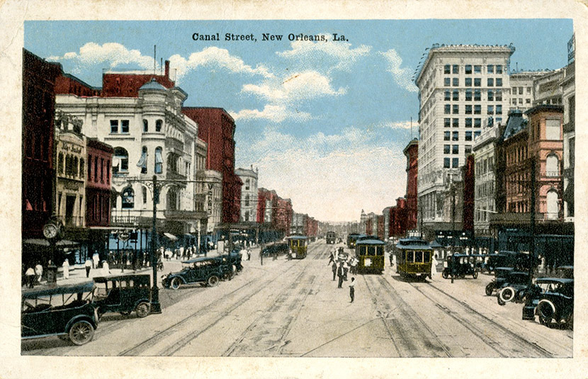A view of Canal Street, the main thoroughfare in New Orleans and the original line dividing the older French and Spanish section of the city from the newer American section.