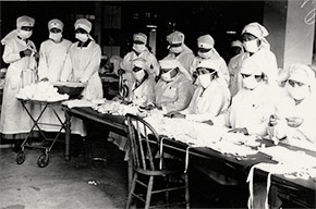 Boston Red Cross volunteers assemble gauze influenza masks for use at hard-hit Camp Devens, Massachusetts.