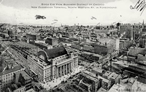 Bird’s-eye view of the Chicago business district, with the North Western Railroad passenger terminal in the foreground.