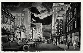 A view of Seventh St. at night, from near the intersection with Hennepin Ave.