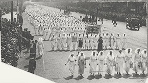 The Newark chapter of the American Red Cross marching to celebrate the end of World War I.