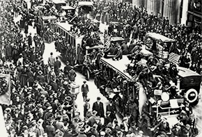 New Yorkers gather in the streets to celebrate Armistice Day, November 11, 1918. Public health officers across the nation feared that such large-scale gatherings would help continue to spread influenza, but knew that there was little they could do to try and stop them.