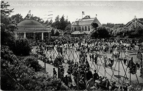 Crowded Children’s Playground at Golden Gate Park in San Francisco, with the carousel and the Sharon Building in the background. With most indoor venues closed during the epidemic, parks and outdoor attractions became particularly important public places.